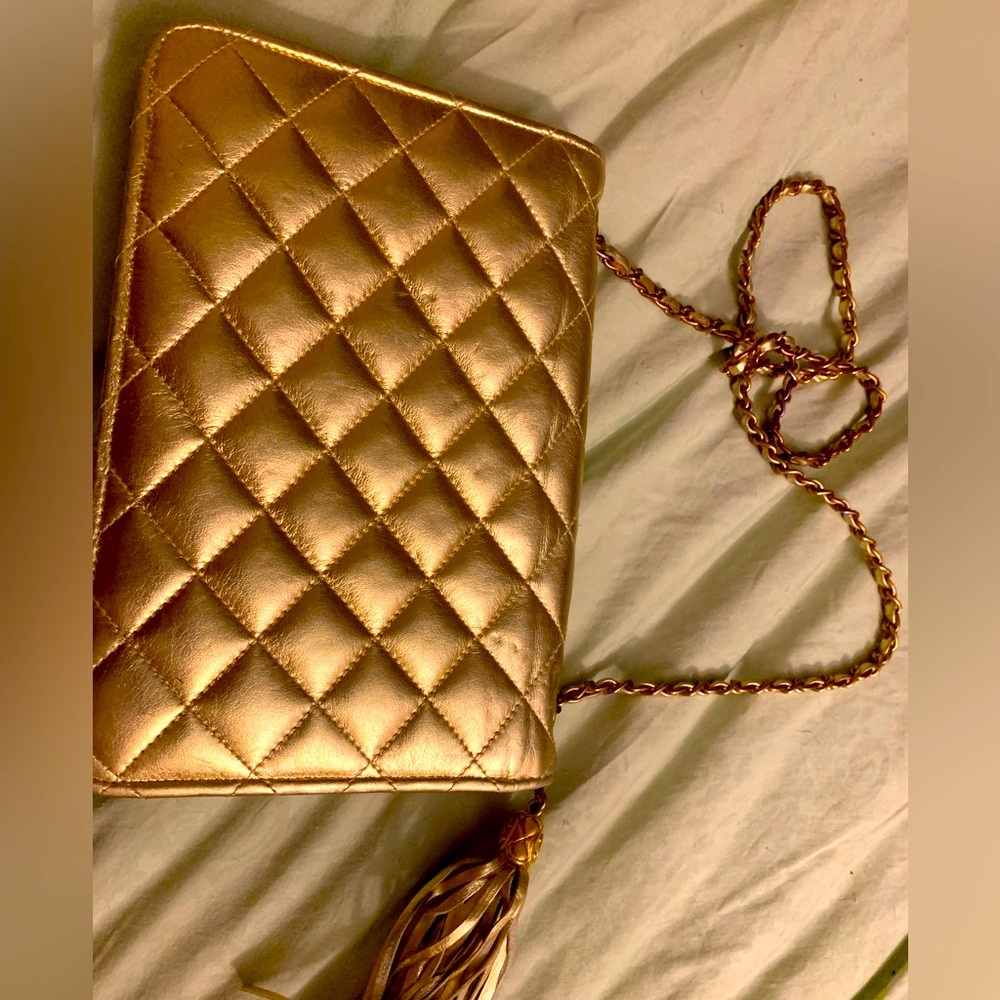 Looks like new vintage gold leather, rare collection purse. Ideal for divas!